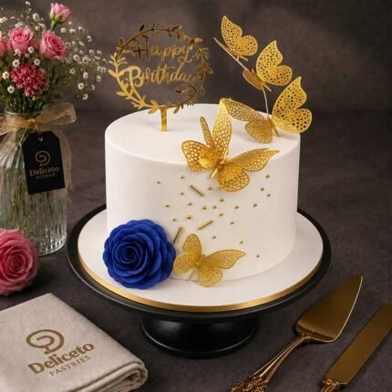 Cake with gold butterflies